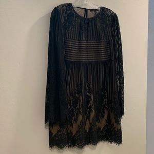 BCBGMaxAzria size S black lace & nude lining long sleeve short dress